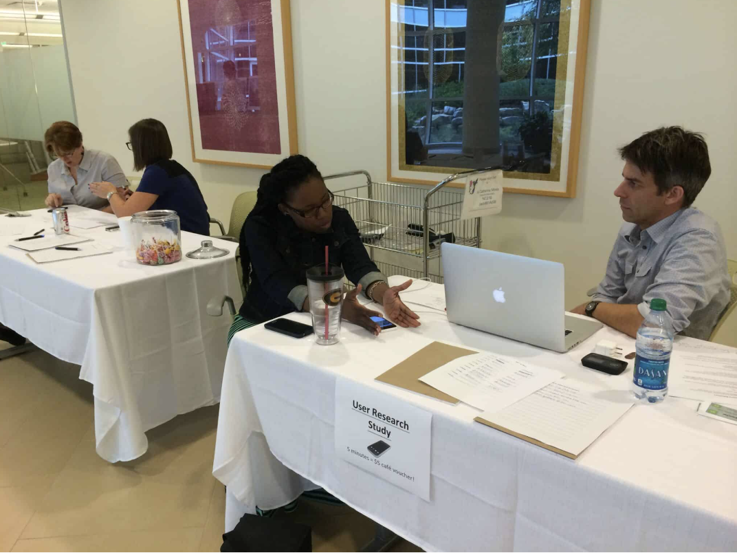 Usability testing session with a participant and a facilitator observing